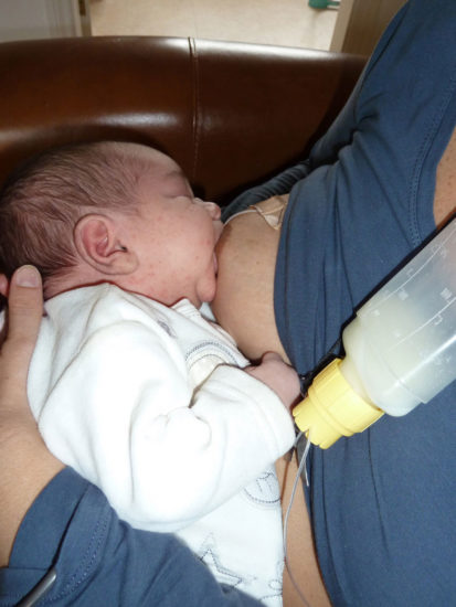 baby held cross-cradle